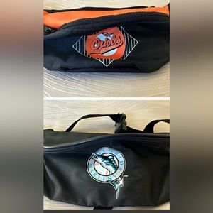 Fanny packs never used one is of Baltimore Orioles the other is Florida Marlins
